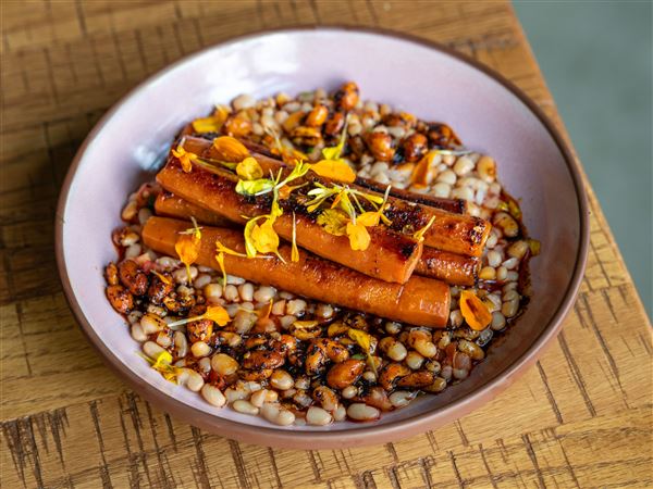 Piloncillo-ginger carrots, chivo blanco beans, peanut salsa macha and pico de gallo from Rising Star Marcella Ogrodnik of Duo's Taqueria.