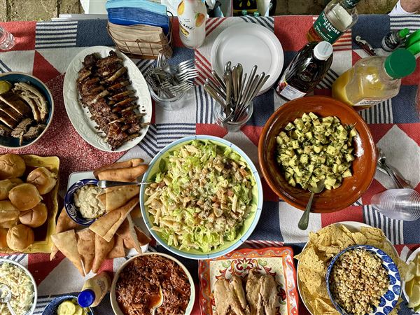 A spread of homemade and locally purchased dishes will make your backyard cookout a big success.