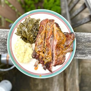 The must-get at The Dream BBQ are the massive pork ribs (pictured are the smallest ones in the bunch), which offer a delightful porcine flavor.