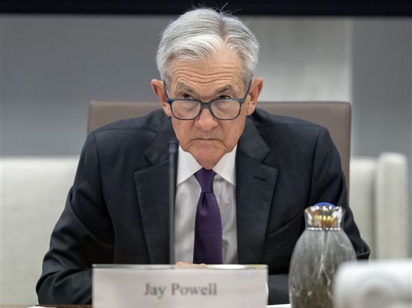 FILE - Federal Reserve Chairman Jerome Powell listens during an open meeting of the Board of Governors at the Federal Reserve on June 25, 2025, in Washington.