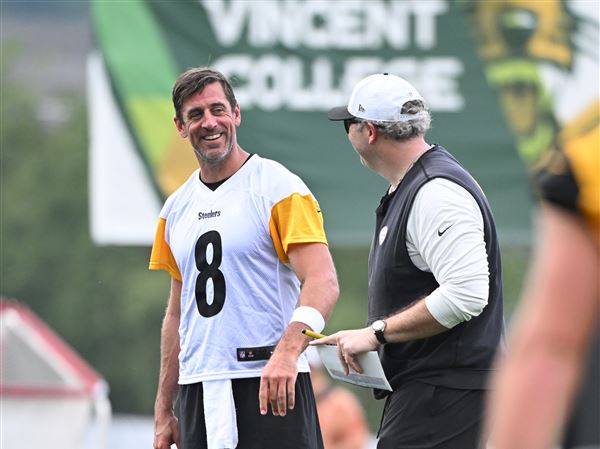 Quarterback Aaron Rodgers and offensive coordinator Arthur Smith chat during practice at Steelers training camp at Saint Vincent College July 25, 2025. 