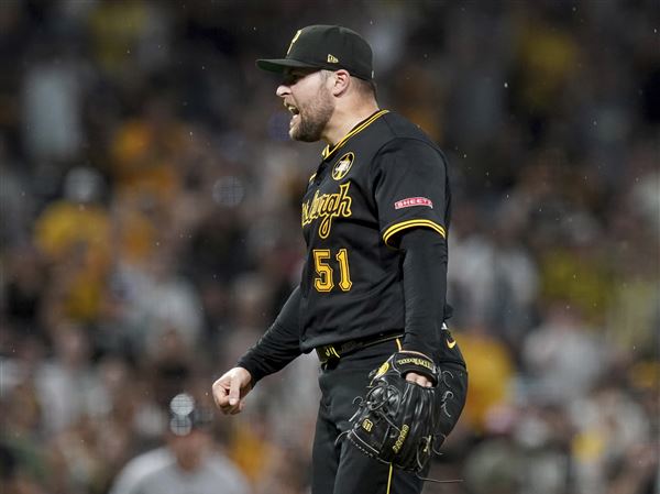 Pittsburgh Pirates pitcher David Bednar reacts after getting the final out of a baseball game against the Arizona Diamondbacks, Saturday, July 26, 2025, in Pittsburgh.