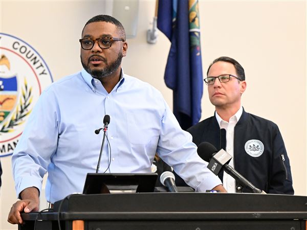 Lt. Gov. Austin Davis and Governor Josh Shapiro speak at a press conference regarding Tuesday’s storm with at the Allegheny County Emergency Services facility in Moon on Wednesday, April 30, 2025. 