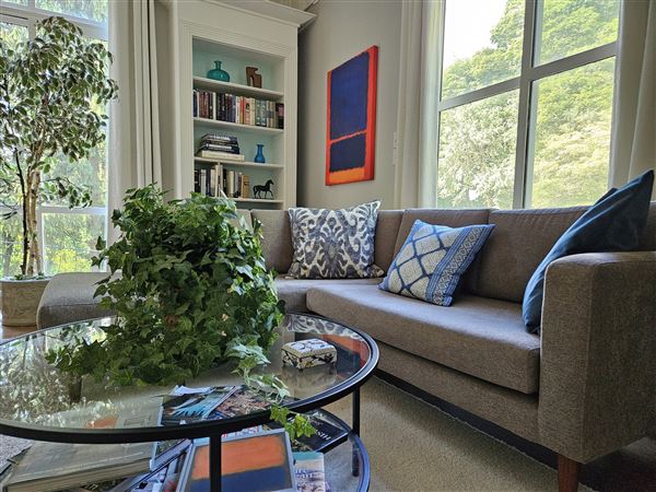The den's redesign is one of Annie Guest's favorites. “It had been the saddest, saddest room. When I finished it I loved it so much I ended up writing the book there," she says.