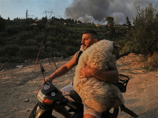 Wildfires kill at least 3 and displace thousands across southern Europe