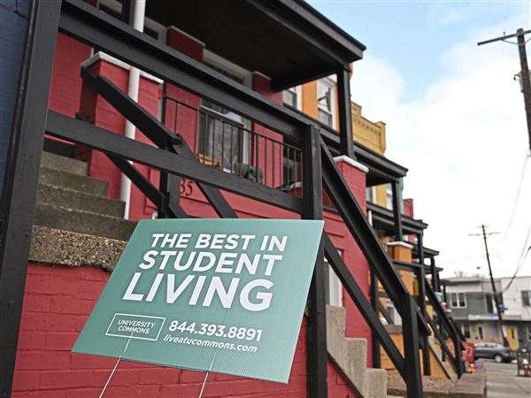 A student housing advertisement stands outside a University Commons property on Dawson St. in  Oakland Tuesday, Feb 25, 2025.