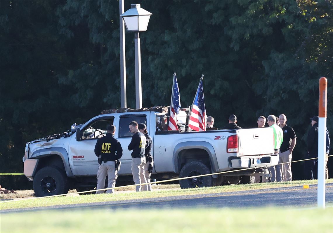 Police remain on scene at burned out Michigan church after shooting and fire leave 4 dead, 8 wounded