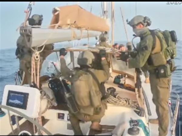 Israeli navy intercepts most flotilla boats and arrests activists. A single boat stops nears Gaza