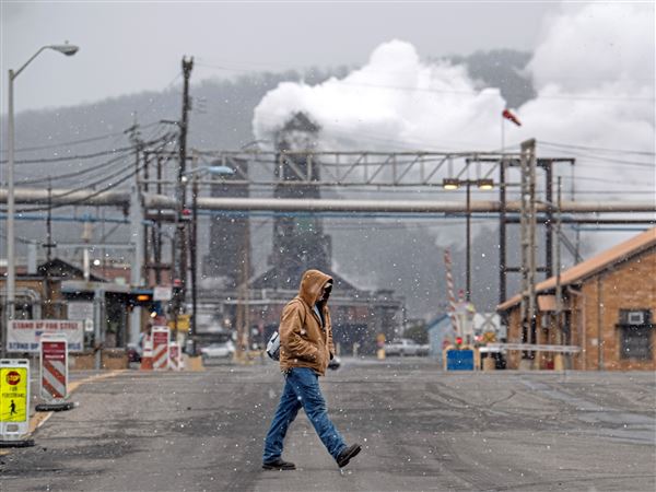 A worker walks at U.S. Steel's Clairton Coke Works. The EPA has reversed its stance on coke oven rules that U.S. Steel previously called unachievable.