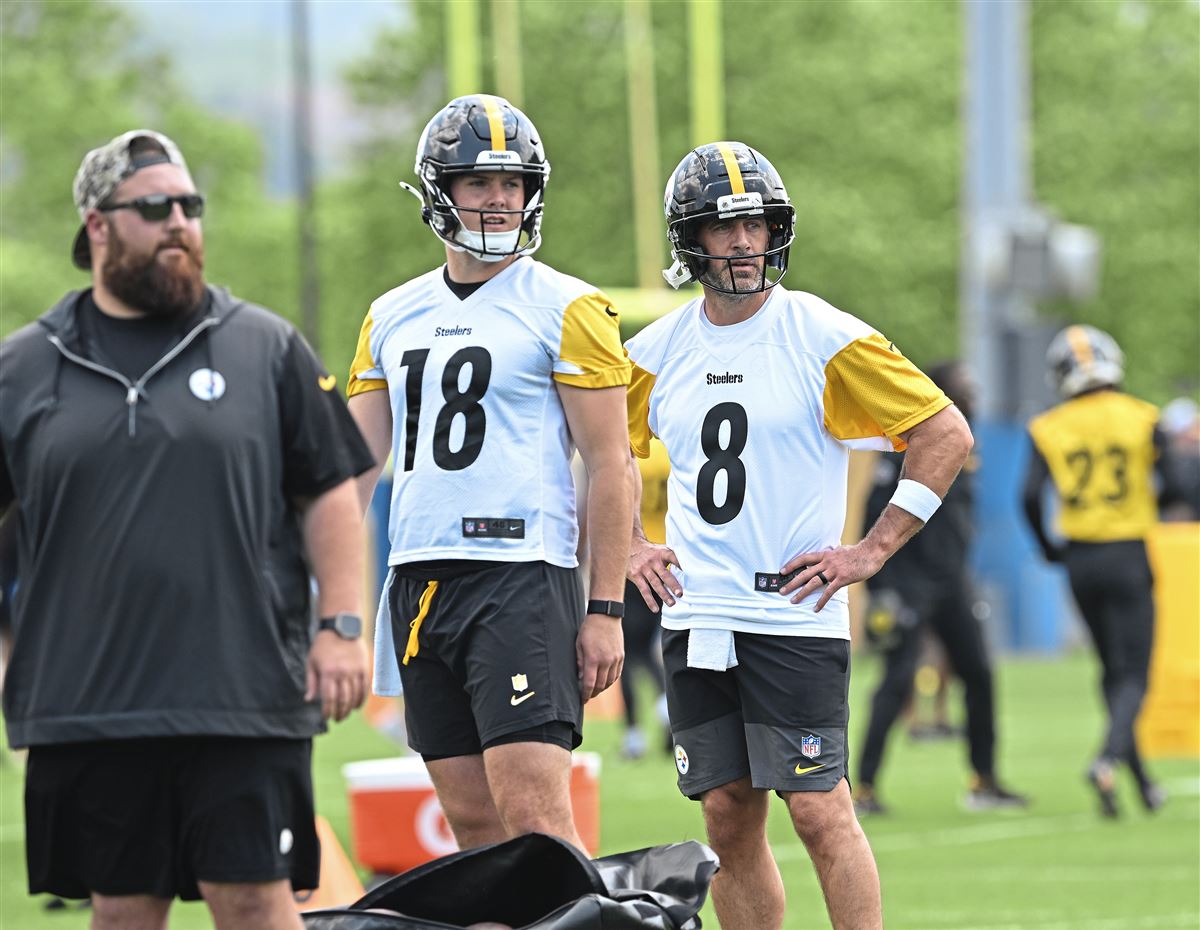 Steelers rookie quarterback Will Howard (18) and Aaron Rodgers (8) watch a drill at Steelers Minicamp at the UPMC Rooney Sports Complex on the South Side on Tuesday, June 10, 2025.   